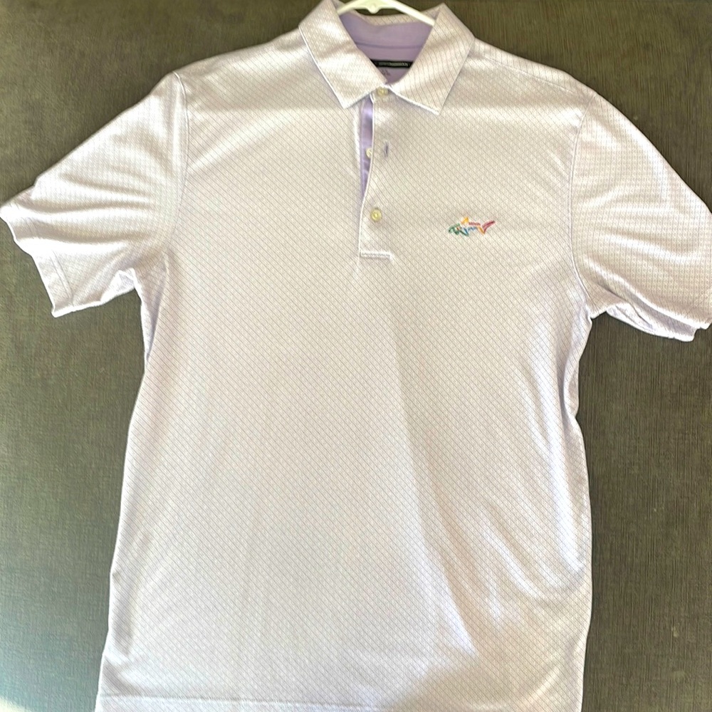 Greg Norman size medium golf shirt. Gently warn